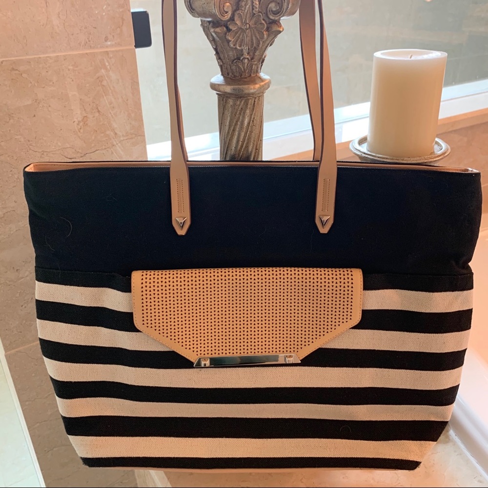 stella & dot Hudson tote and City Slim clutch